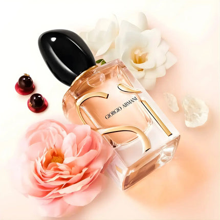 Giorgio Armani Si Eau De Parfum Refillable 100ml bottle with pink and white flowers.