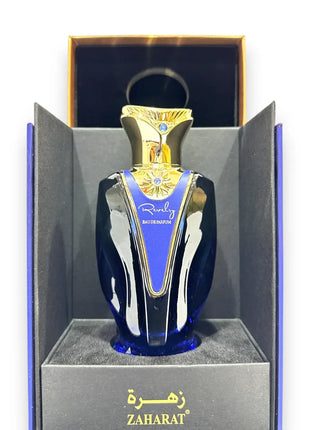 Zaharat Revelry Eau de Parfum 100ml elegantly presented in an ornate box, showcasing its luxurious design and vibrant essence.
