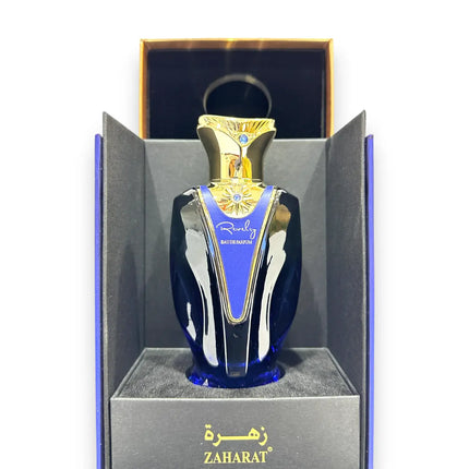 Zaharat Revelry Eau de Parfum 100ml elegantly presented in an ornate box, showcasing its luxurious design and vibrant essence.
