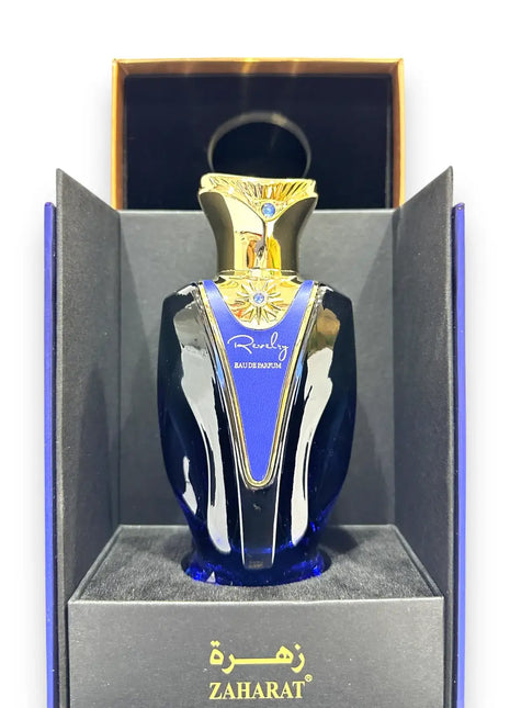 Zaharat Revelry Eau de Parfum 100ml elegantly presented in an ornate box, showcasing its luxurious design and vibrant essence.
