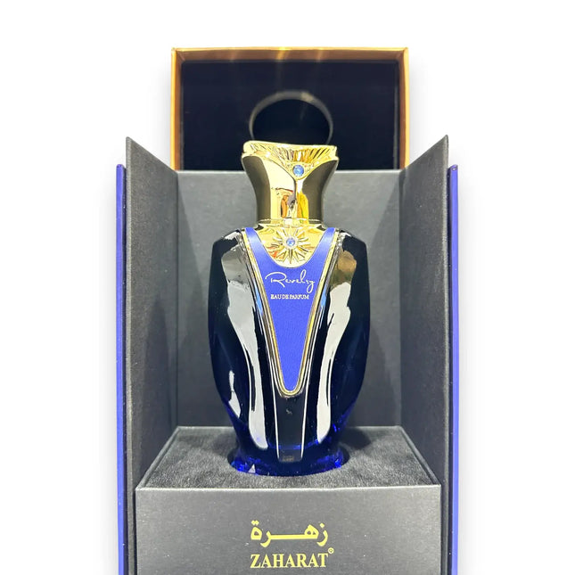 Zaharat Revelry Eau de Parfum 100ml elegantly presented in an ornate box, showcasing its luxurious design and vibrant essence.