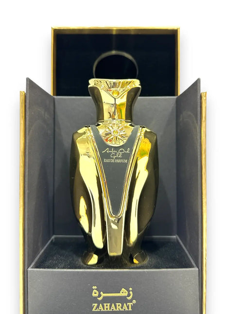 Zaharat Amber Oud Gold Eau de Parfum 100ml in a luxurious gold bottle displayed in packaging.