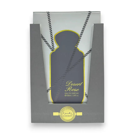 Zaharat Desert Rose Eau de Parfum 100ml packaging featuring elegant design and bold colors.