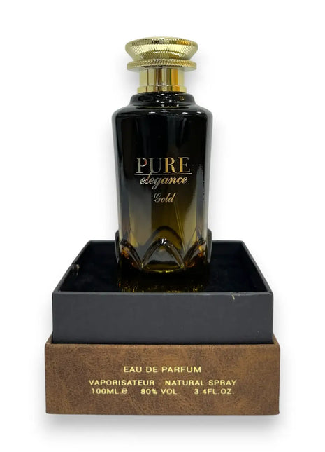 Pure Elegance Gold Eau de Parfum 100ml bottle displayed on a sleek black box with a stylish design.