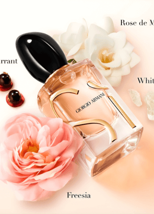 Giorgio Armani Sì Eau De Parfum 100ml bottle with floral accents, featuring Rose de Mai, Blackcurrant nectar, Freesia, and White musk.