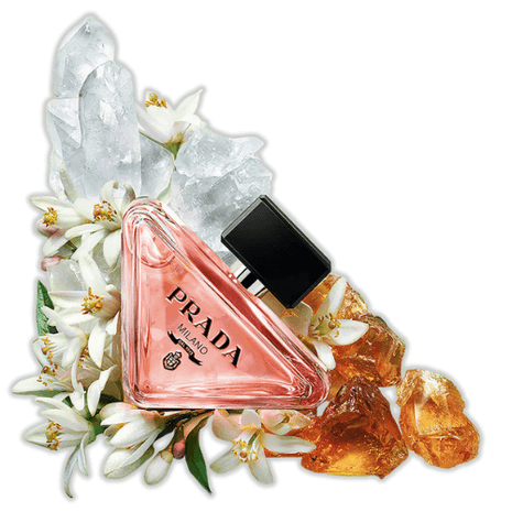 Prada Paradoxe Eau de Parfum 90ml showcased with floral and crystal elements, highlighting its luxurious appeal.